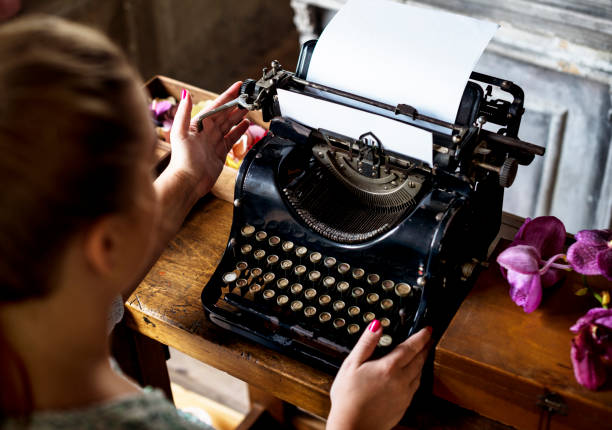 istock Woman typing typewriter on the table 690262898
