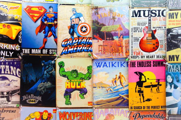 Old Comics and Signs Honolulu, Hawaii, USA - May 30, 2016: Old Comics and signs for sale at a Waikiki Market Stall superman named work stock pictures, royalty-free photos & images