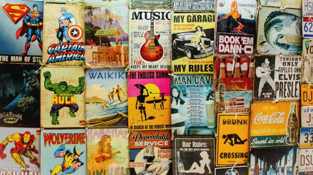 Old Comics and Signs Honolulu, Hawaii, USA - May 30, 2016: Old Comics and signs for sale at a Waikiki Market Stall superman named work stock pictures, royalty-free photos & images