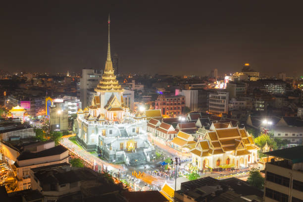 istock Monk and people walk around the temple for worship. 690265666