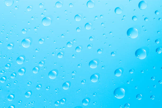 istock water droplets on blue glass 690269928