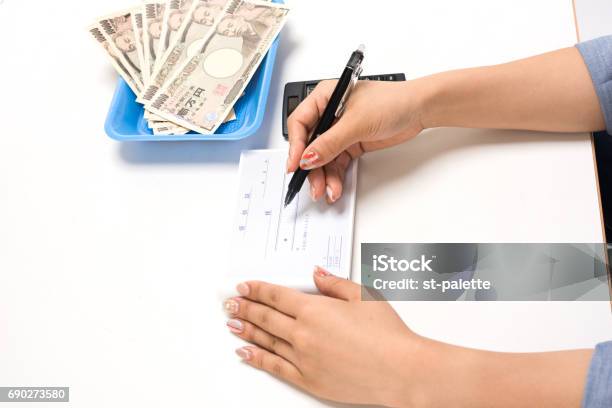 Young Japanese Woman Doing Office Work White Background White Background Stock Photo - Download Image Now