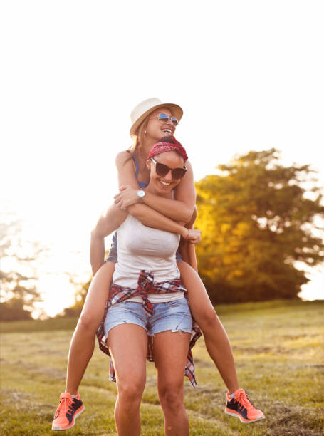 istock Group of friends running free 690280912