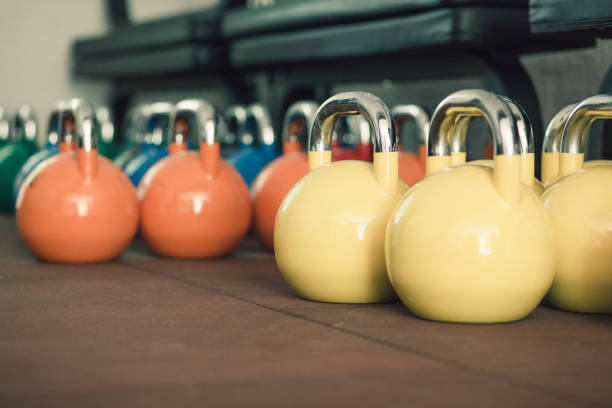 istock Colorful kettle bells in gym 690281396
