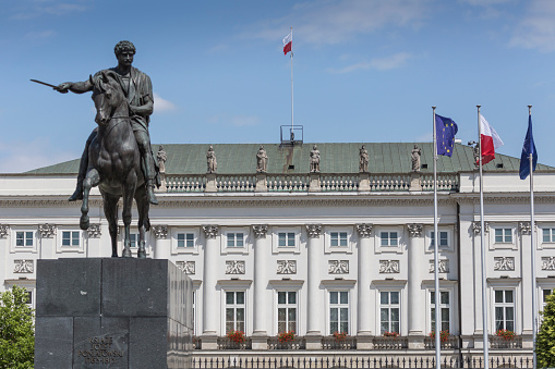 WARSAW, POLAND - JULY 09, 2015: Presidential Palace in Warsaw, Poland. Before it: Bertel Thorvaldsen's equestrian statue of Prince Jozef Poniatowski.
