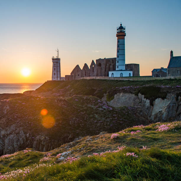 istock Abbey ruin and lighthouse, Pointe de Saint-Mathieu, Brittany, France 690298532