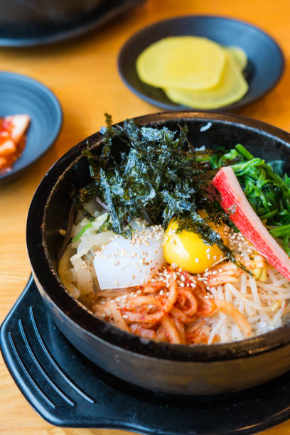 istock bibimbap in the black bowl 690304068
