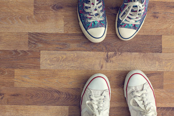 istock top view sneakers on wooden floor 690310446