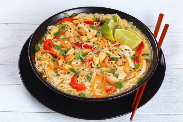 istock tasty Thai Chicken noodle soup, close-up 690311178