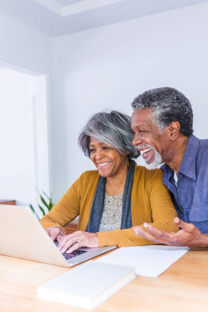 istock Senior African American Couple Doing Home Finances on Computer 690315274
