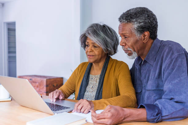 istock Senior African American Couple Doing Home Finances on Computer 690315282