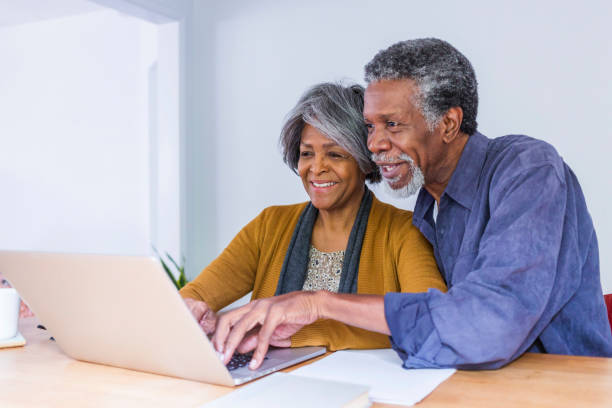 istock Senior African American Couple Doing Home Finances on Computer 690315288