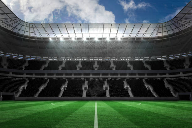 istock Large football stadium with empty stands 690316224