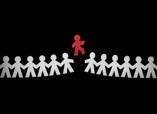 istock Member of team standing out from the crowd 690319868