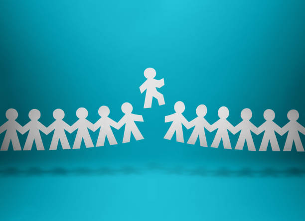 istock Member of team standing out from the crowd 690319870
