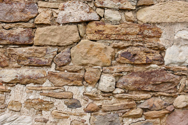 istock Stone and concrete textured background. Warm tone. 690325830
