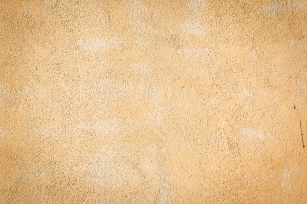 Textures of the beige wall. Tuscany terracotta facade background. sand stone wall stock pictures, royalty-free photos & images