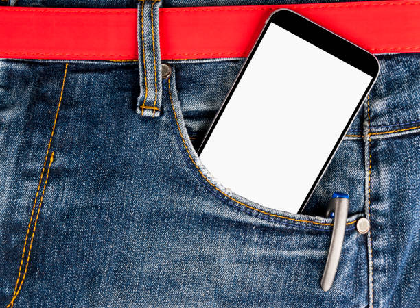 istock Smartphone with isolated white screen with empty space for text in a denim jeans pocket 690334194