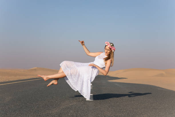 istock Young beautiful girl floating in the air. 690345986