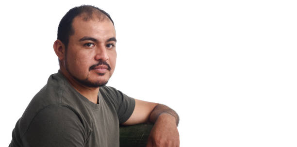 istock Portrait of a latin man on white background 690346140