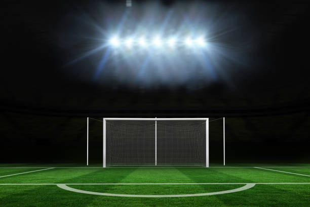 istock Football pitch under spotlights 690347084