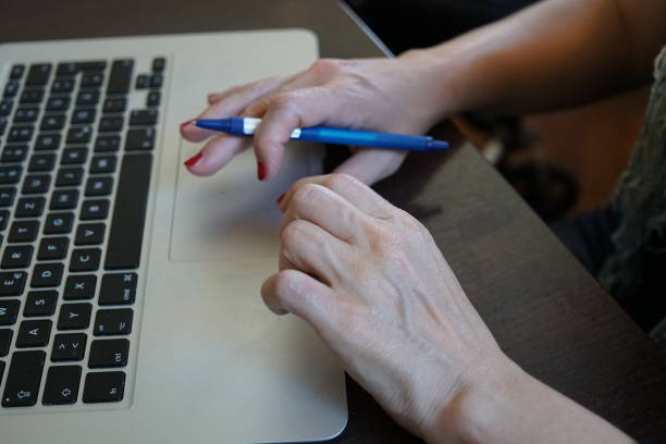 istock Female worker sitting at her place of work 690360306