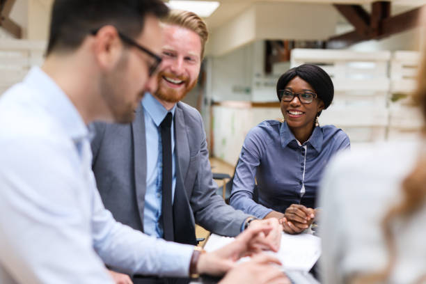istock Business people cooperating and exchanging ideas during informal meeting 690361392