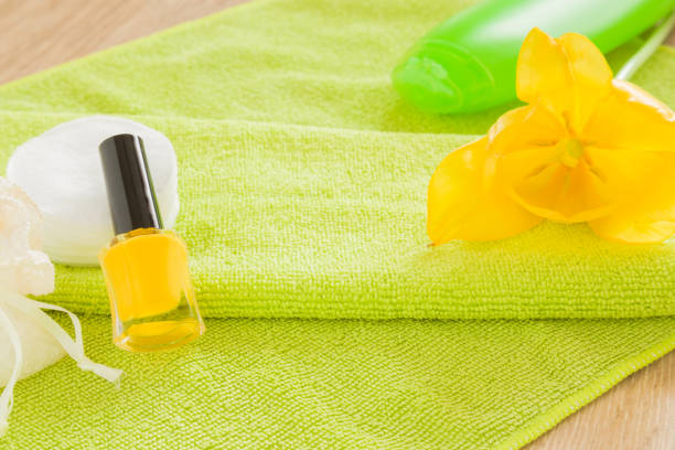 Spring and summer atmosphere with yellow and green colors on the manicure beauty salon table. Spring and summer atmosphere with yellow and green colors on the manicure beauty salon table. yellow nail polish stock pictures, royalty-free photos & images