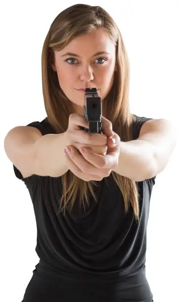 Photo of Femme fatale pointing gun at camera