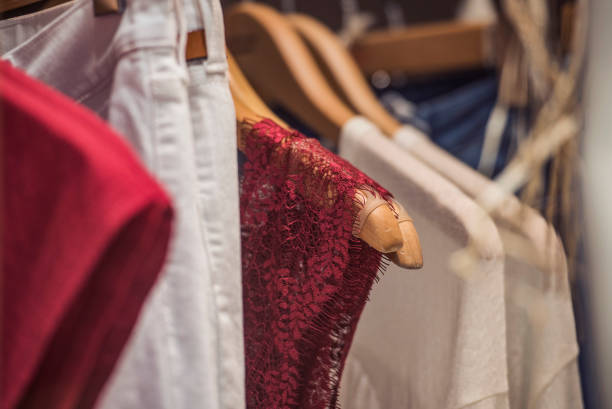 istock Fancy clothing on racks in a store in Paris. 690368230