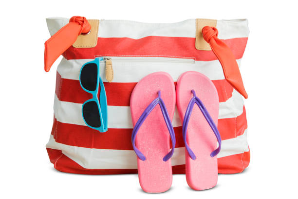 istock Beach bag with sandal and sunglasses 690371958