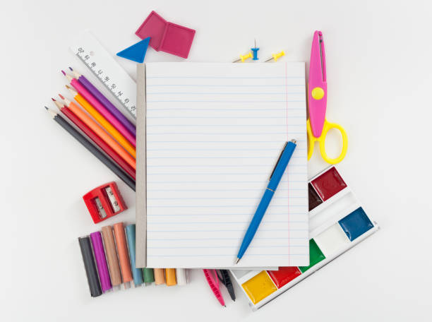 istock School supplies on white background. Place for text. 690379136