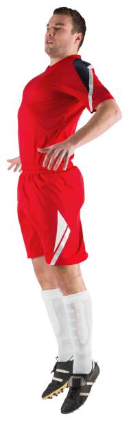 istock Football player in red jumping 690379464