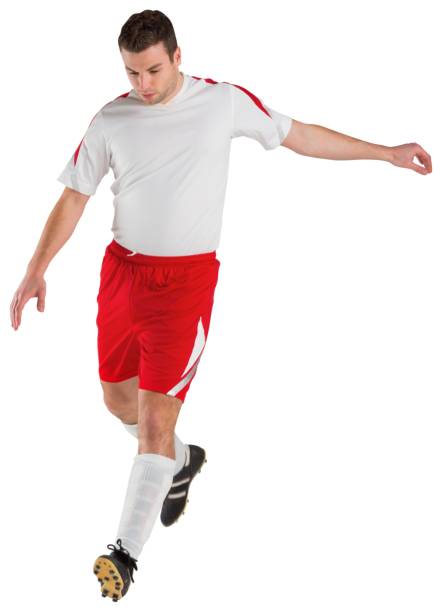 istock Football player in white kicking 690382056