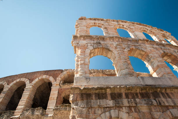 Landmarks of Verona Partial view of the external perimeter of the Verona Arena, Italy verona opera stock pictures, royalty-free photos & images