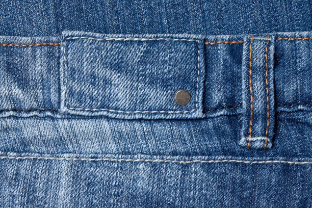 collection of various  jeans labels on white background. each one is shot separately.