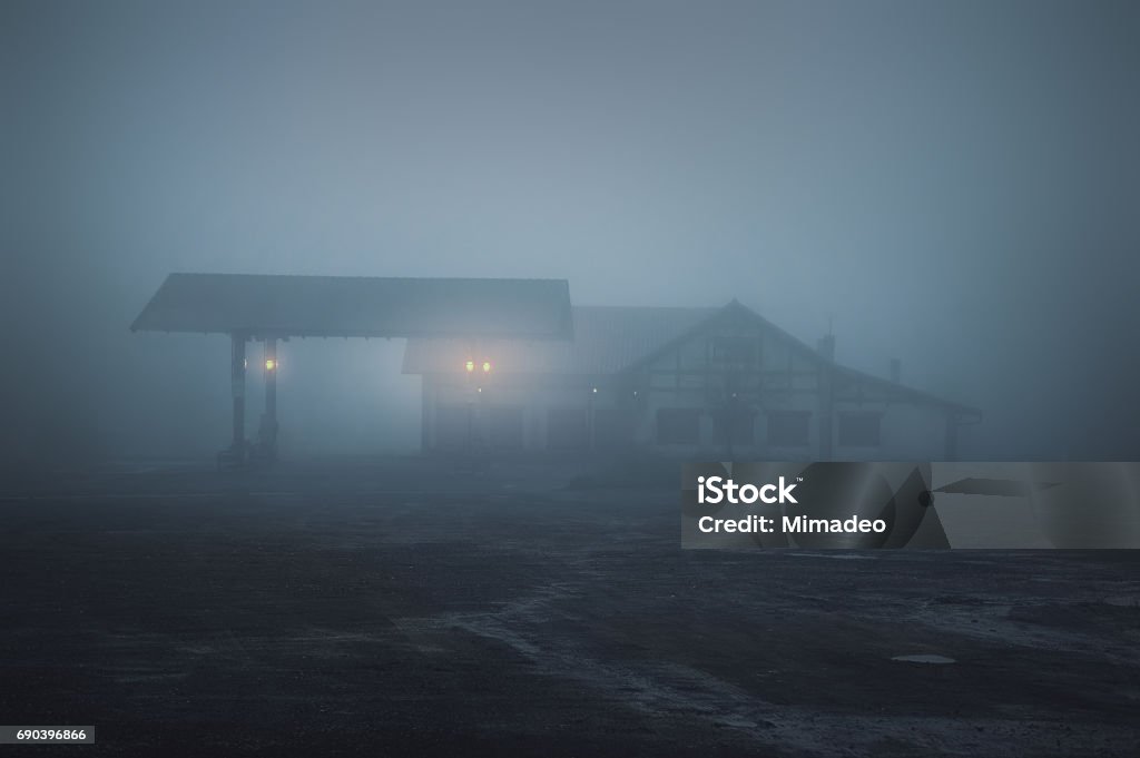 scary old gas station at night scary old gas station at the night Spooky Stock Photo