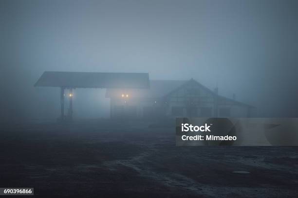 Scary Old Gas Station At Night Stock Photo - Download Image Now - Spooky, Night, Ghost Town