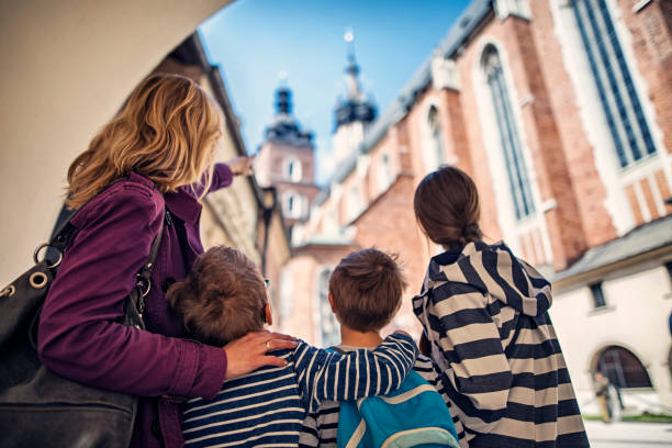 istock Family visiting Cracow, Poland 690397774