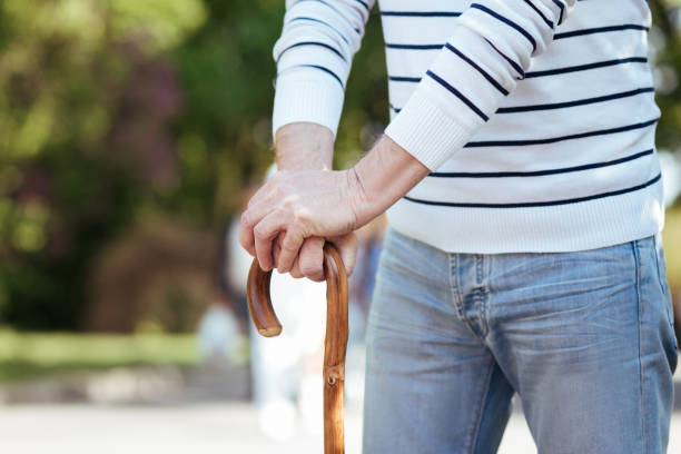 istock Senior man enjoying promenade in the park 690401314