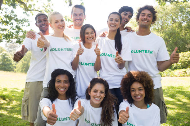 istock Volunteers gesturing thumbs up 690403554