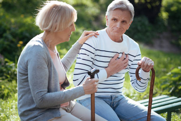 istock Aging couple sitting and feeling bad in the park 690403608