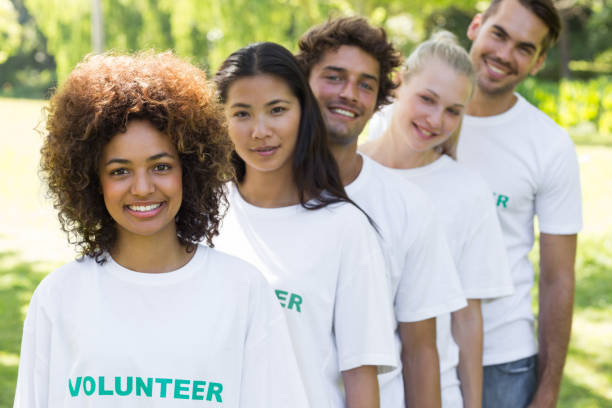 istock Volunteers standing in a line 690404358