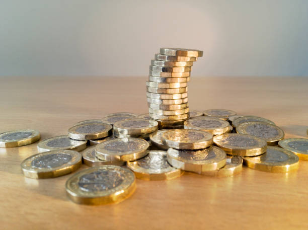 istock Pile of Pound coins 690406738