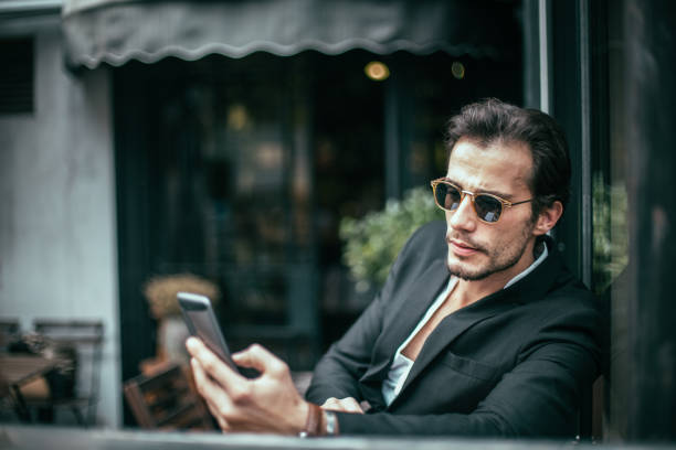istock Businessman texting at the cafe 690406862
