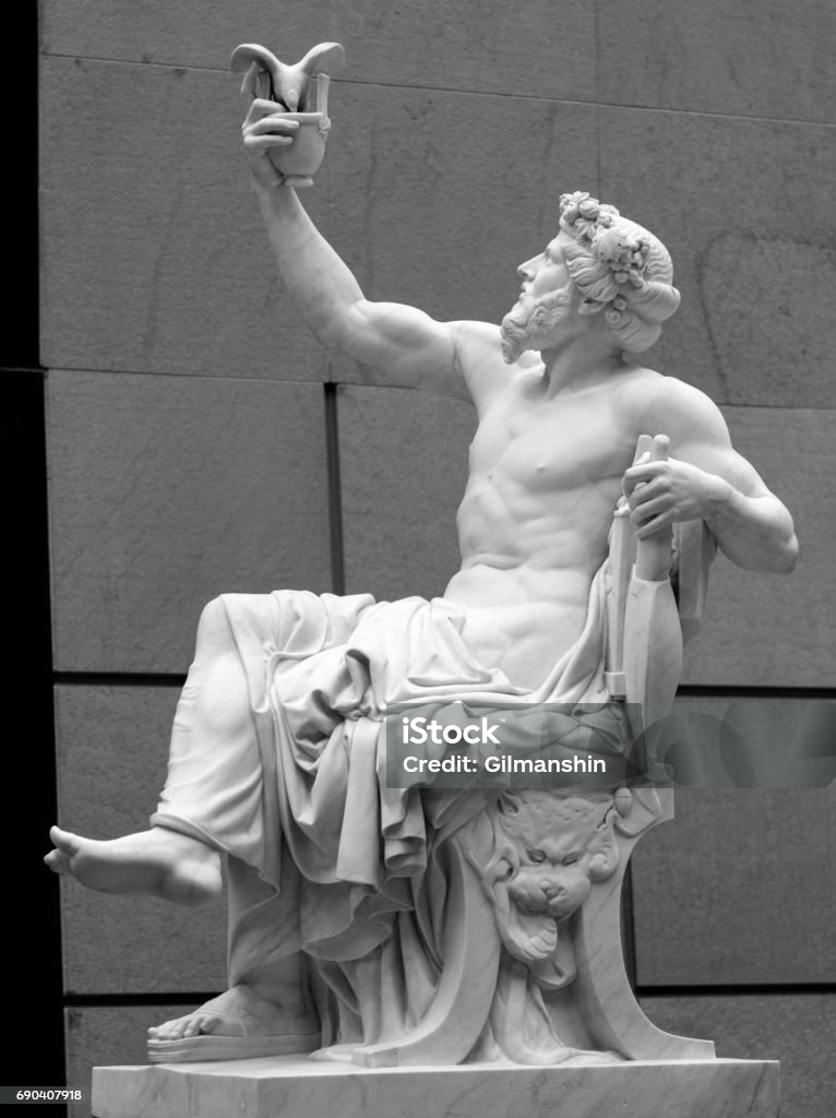 Head and shoulders detail of the ancient sculpture Head and shoulders detail of the ancient sculpture. Statue Stock Photo