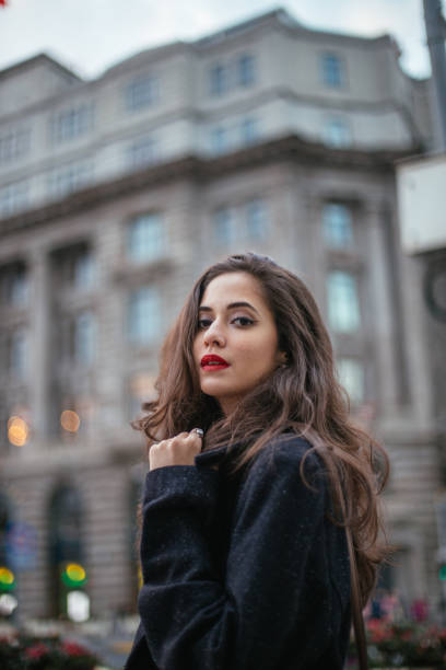 istock Beautiful woman in winter coat 690411364