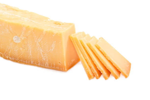 istock Partially sliced Dutch hard cheese Beemster closeup 690415024
