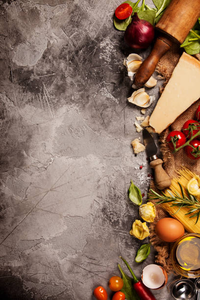 istock Italian food background. Slate background with space for text 690415334