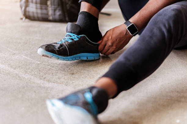 istock Relaxed sporty guy ending physical drill 690422910
